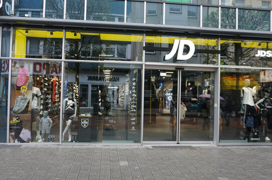 Gelsenkirchen, Germany - April 18, 2024: JD Sports store signage. The company is the UK's leading sports fashion retailer