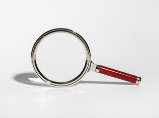 Magnifying glass for detailed research, zoom on documents. Science and business study, inspecting