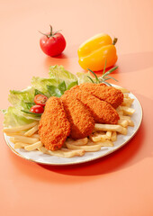 Spicy Tandoori Breaded Chicken Fried fillets with fires and salads