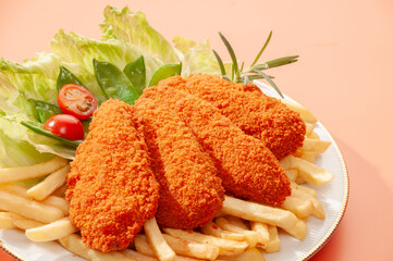 Spicy Tandoori Breaded Chicken Fried fillets with fires and salads