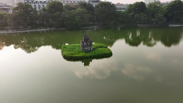 Aerial drone view of Turtle Tower (Thap Rua) on Hoan Kiem lake in Hanoi, Vietnam