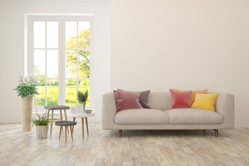 White living room with sofa and summer landscape in window. Scandinavian interior design. 3D illustration