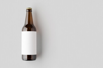 Amber beer bottle mockup with a blank label and copyspace.