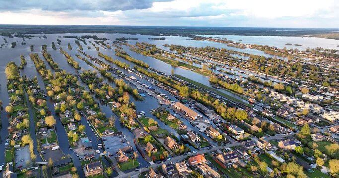 Aerial drone view on the Vinkeveense Plassen Recreational water sports area at sunset