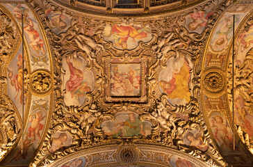 Fototapeta na wymiar MILAN, ITALY - MARCH 5, 2024: The baroque ceiling with the frescoes (prophets and patriarch) in the side nave of church Chiesa di San Vittore al Corpo. 
