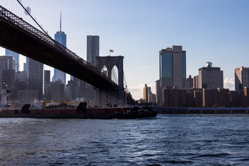 Iconic Brooklyn Bridge connecting New York City's urban landscape with stunning skyline and...