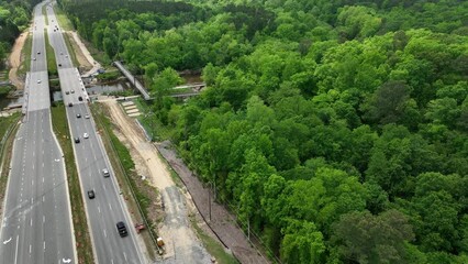 Aerial video above Louisburg road in North Raleigh in spring.