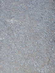 gray solid background of fine gravel crumbly texture