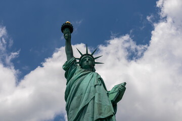A close up on an iconic representation of freedom and independence, the Statue of Liberty with...