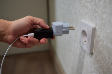 Turning off appliances that are not working saves energy. Unused phone chargers or power adapters.