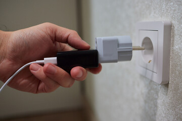 Turning off appliances that are not working saves energy. Unused phone chargers or power adapters.