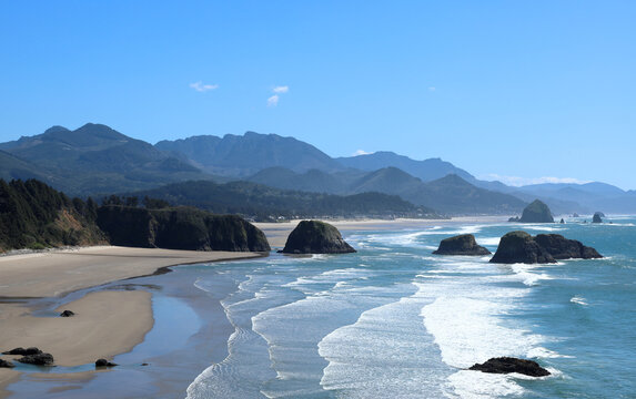 View from Ecola State Park Viewpoint overlooking Crescent Beach and in the distance Canon Beach with its famous Haystack Rock - Oregpn, Pacific Northwest