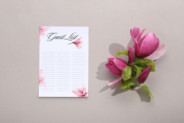 Guest list and beautiful flowers on grey background, flat lay. Space for text