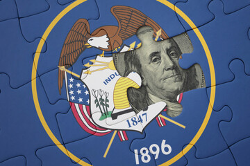 puzzle with the national flag of utah state and usa dollar banknote. finance concept