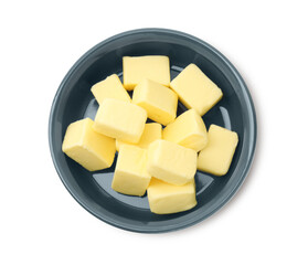 Tasty butter cubes in bowl isolated on white, top view