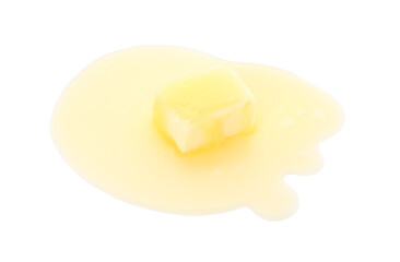 Piece of melting butter isolated on white