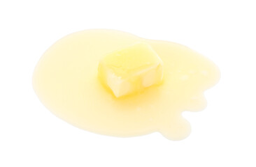 Piece of melting butter isolated on white