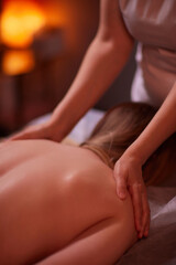 Fototapeta premium Ayurveda Back Massage with aromatherapy essential oil