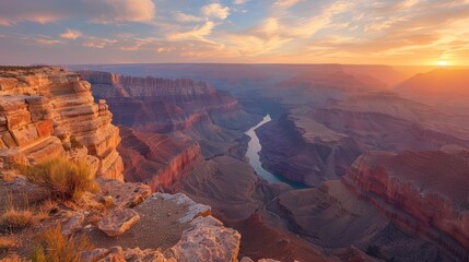 The Grand Canyon's majestic vistas enhanced by a dramatic sunset and the Colorado River carving its way