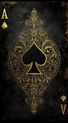 Ornate golden ace of spades playing card on dark textured background