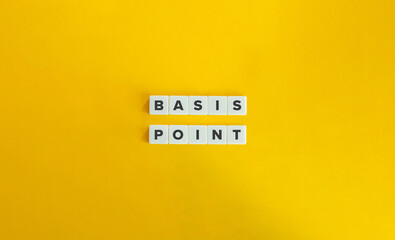 Basis Point Term. One Hundredth of a Percentage Point. Text on Block Letter Tiles on Yellow Background. Minimal Aesthetics.