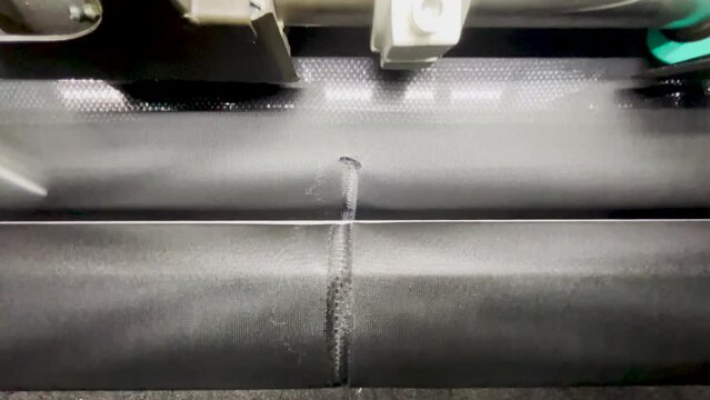 A view of knitting defects on the fabric of a thread break in a knitting machine in the textile industry