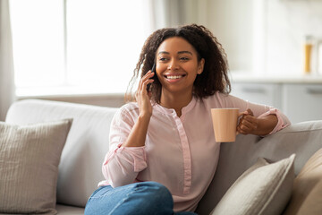 Black Woman Have Joyful Conversation Over Morning Coffee