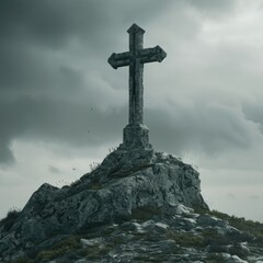 Large stone cross on top of a hill. 