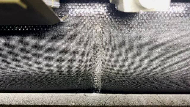 A view of knitting defects on the fabric of a thread break in a knitting machine in the textile industry