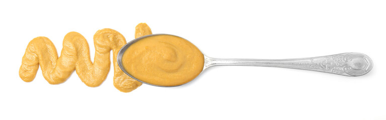Tasty mustard sauce and spoon isolated on white, top view