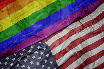 waving colorful flag of united states of america and gay rainbow flag on the dollar money...