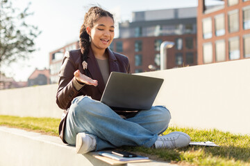 Girl Student Sitting on Ground Using Laptop, Studying