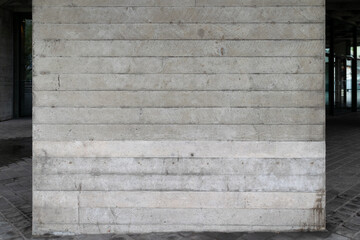 Concrete wall with horizontal lines and subtle textures. Urban construction background. Modern...