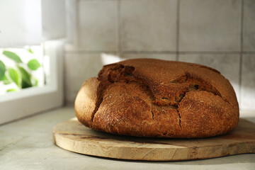 Freshly baked sourdough bread on light table