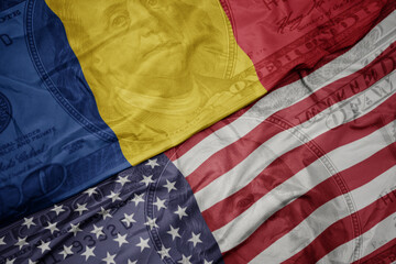 Obraz premium waving colorful flag of united states of america and national flag of romania on the dollar money background. finance concept. macro