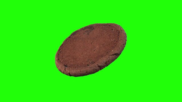 Brown cookie rotating on green background. Looping animation