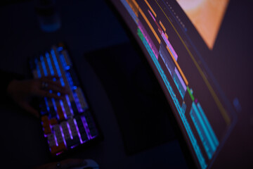 a close up of a computer screen with a keyboard in the background