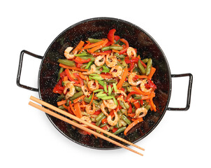 Shrimp stir fry with vegetables in wok and chopsticks on white background, top view