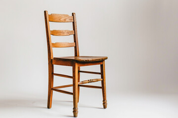 A classic ladderback chair with a plain white background.