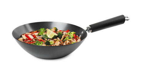 Stir-fry. Tasty noodles with meat and vegetables in wok isolated on white
