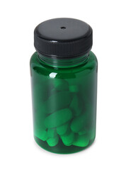 Vitamin pills in bottle isolated on white