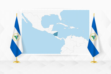Map of Nicaragua and flags of Nicaragua on flag stand.