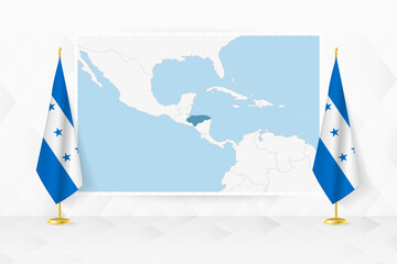 Map of Honduras and flags of Honduras on flag stand.