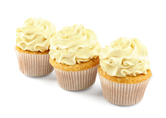 Tasty vanilla cupcakes with cream isolated on white