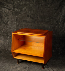 wooden vintage furniture on gray background