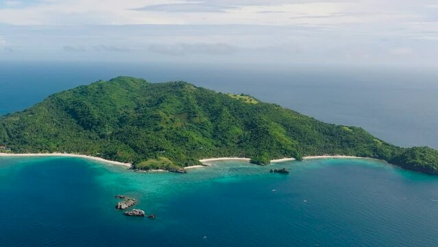 Cobrador Island surrounded by blue sea. Romblon, Philippines. Travel concept.