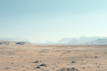 Vast desert landscape with mountains in the distance