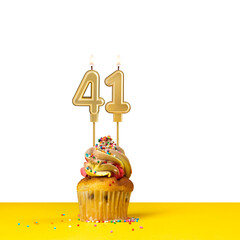 Birthday candle number 41 - Cupcake on white background