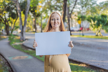pregnant woman takes a stand for the rights of pregnant women, engaging in a solo picket to...