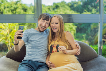 In a touching moment, the pregnant woman and father connect via video call, sharing the joy as they hold up an ultrasound photo, bridging the distance with the anticipation of their baby's arrival